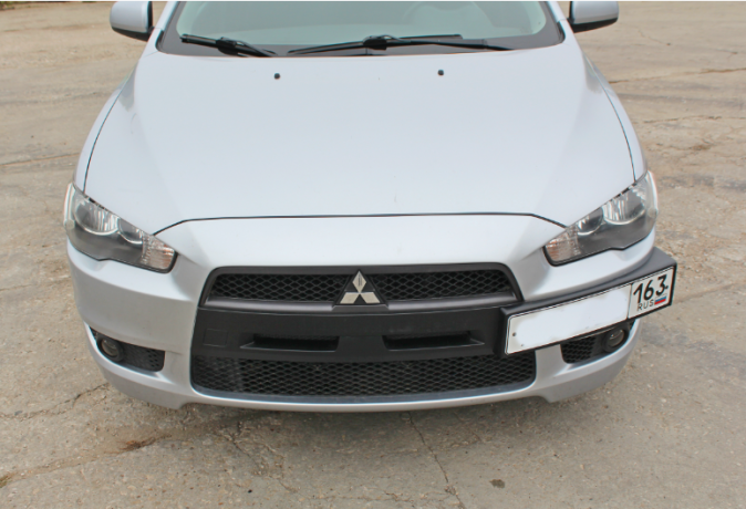 Рамка под номер на передний бампер для Mitsubishi Lancer X (2007-2016) купить недорого с доставкой в Канск