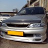 Накладка на передний бампер Toyota Carina (210) Рестайлинг купить недорого с доставкой в Канск